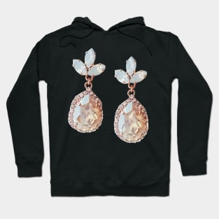 Rose-gold costume jewellery earrings with nude crystals and moon stones. Hoodie